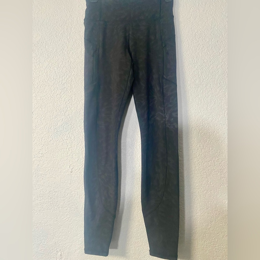 Athleta Black Rainier Reflective Tight black animal print leggings